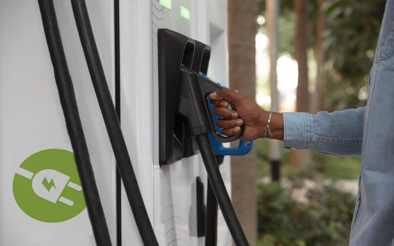 side-view-man-charging-electric-car